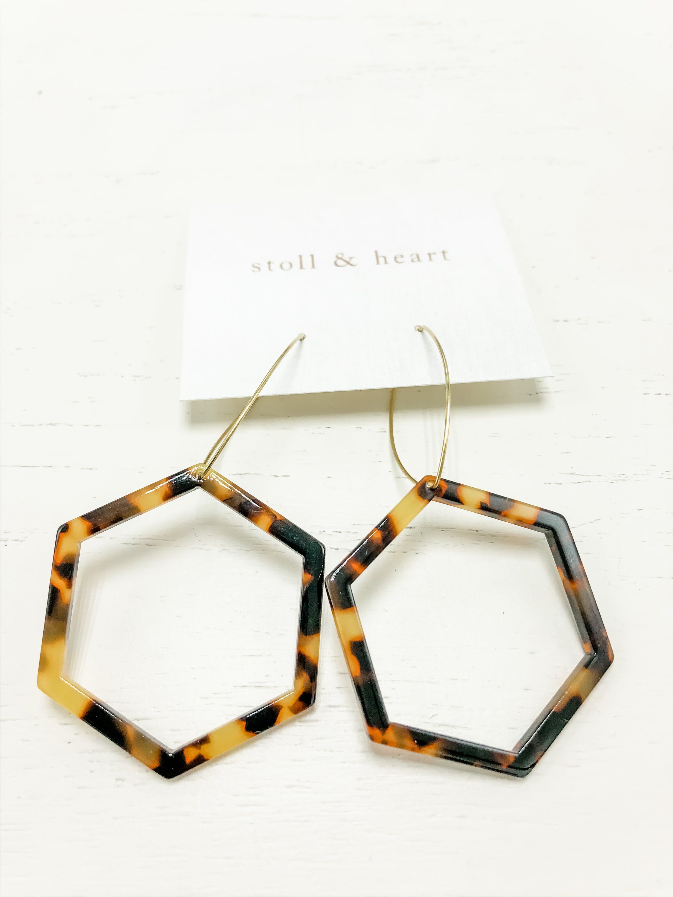 Mae Dark Tortoise earrings featuring brass hoops and dark tortoise shell resin detail, measuring approximately 3 inches in length.